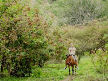 Andrew Wharton rides his adopted horse, Jorge, at the San Jose del Tajo RV motorhome park in Tlajomulco, Jalisco, Mexico, near Guadalajara