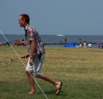 Andrew J. Wharton playing beach badminton at Shane and Dave's wedding at Sandy Point State Park, Maryland